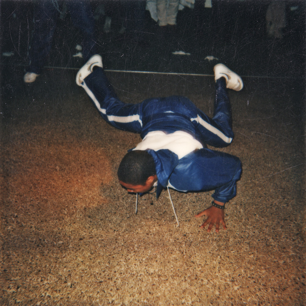 Break dancing at Personal Effects Top of the Plaza record release party.