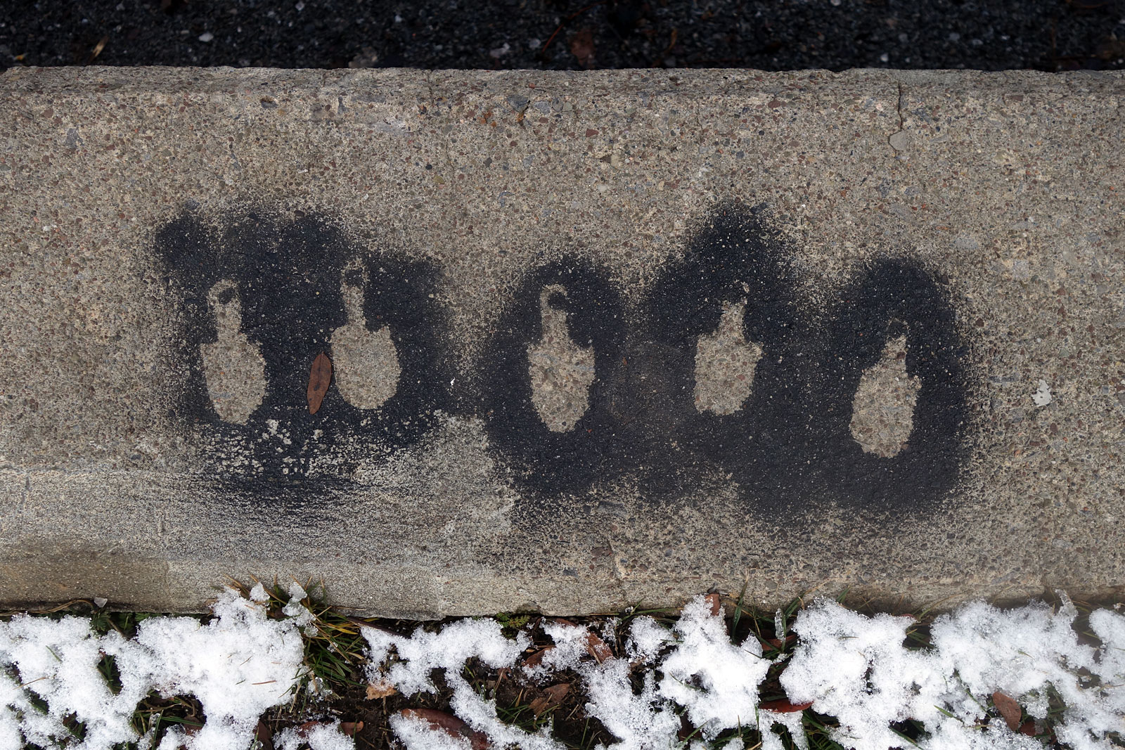 Spray paint art on sidewalk at Wegman's in Rochester, New York