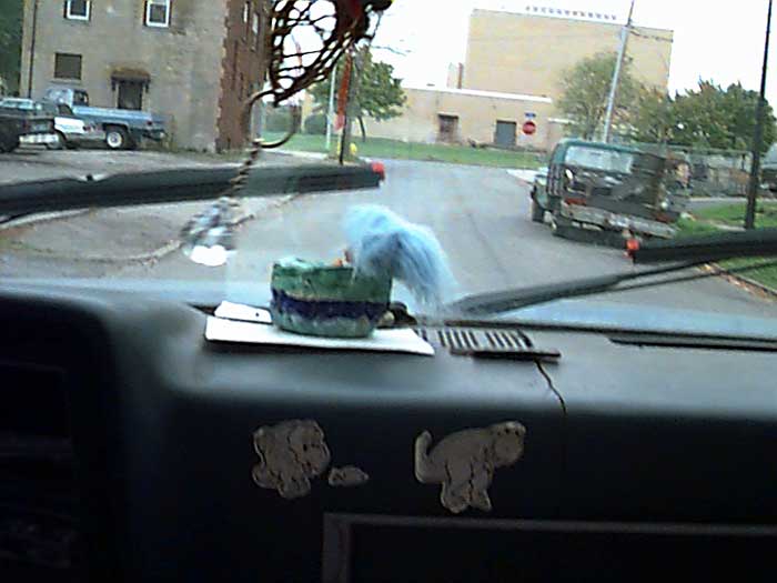 Dashboard of Sparky's truck as we drive down Hall Street.