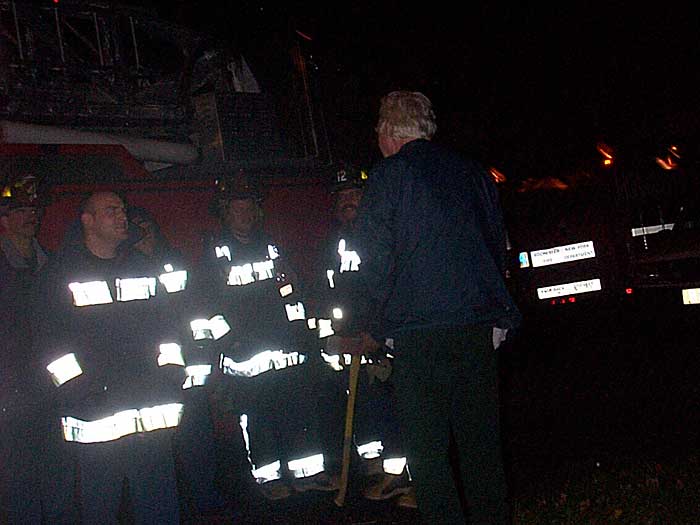 Sparky entertains the firemen out in front of his house. Can't remember why they were called.