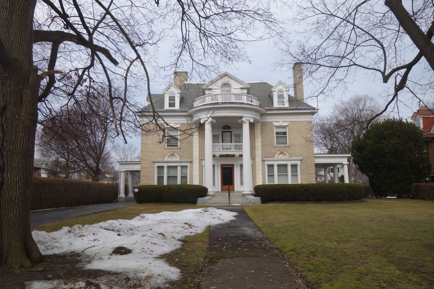 East Avenue home with white columns in Rochester, New York