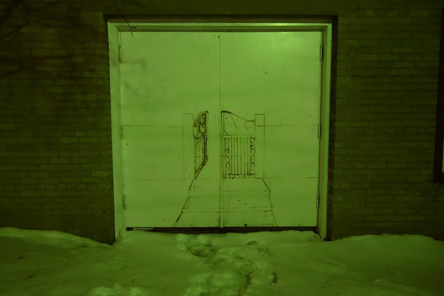Green door being Rochester Contemporary Art Center in winter.