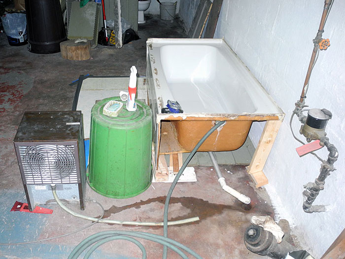 Sparky had his bathroom redone and he set up this temporary bathtub in his basement.