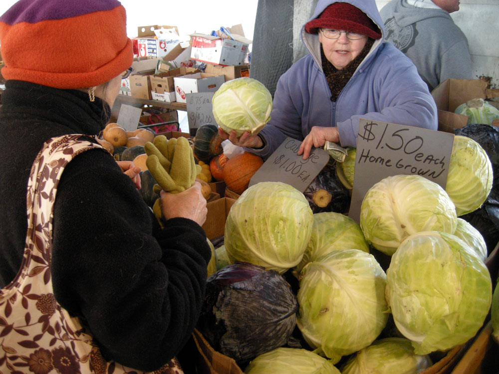 Peggi buying cabbage at the Public Market in Rochester, NY