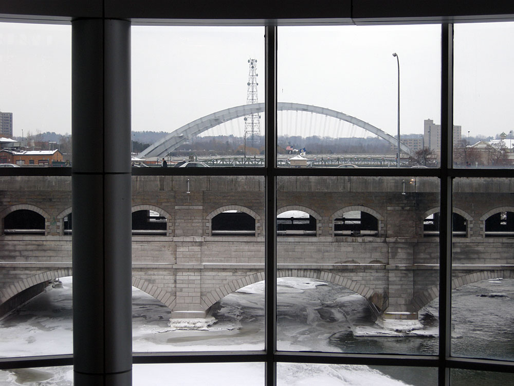 Susan B. Anthony Frederick Douglas bridge behind Broad Street bridge over the Genesee River in Rochester, NY