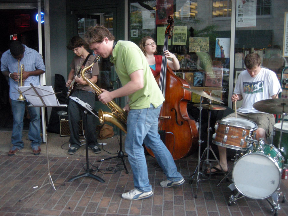 Band performing on the street in front of Greenwood Books on East Avenue during the Rochester International Jazz Festival