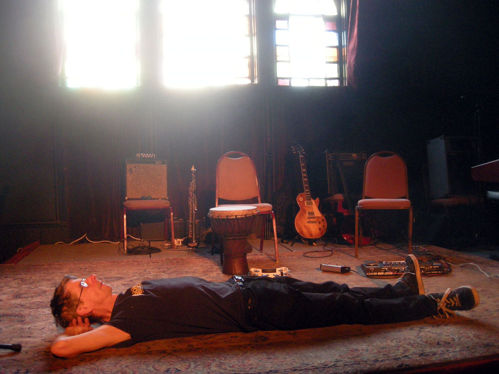 Paul laying on the stage at MUCCC