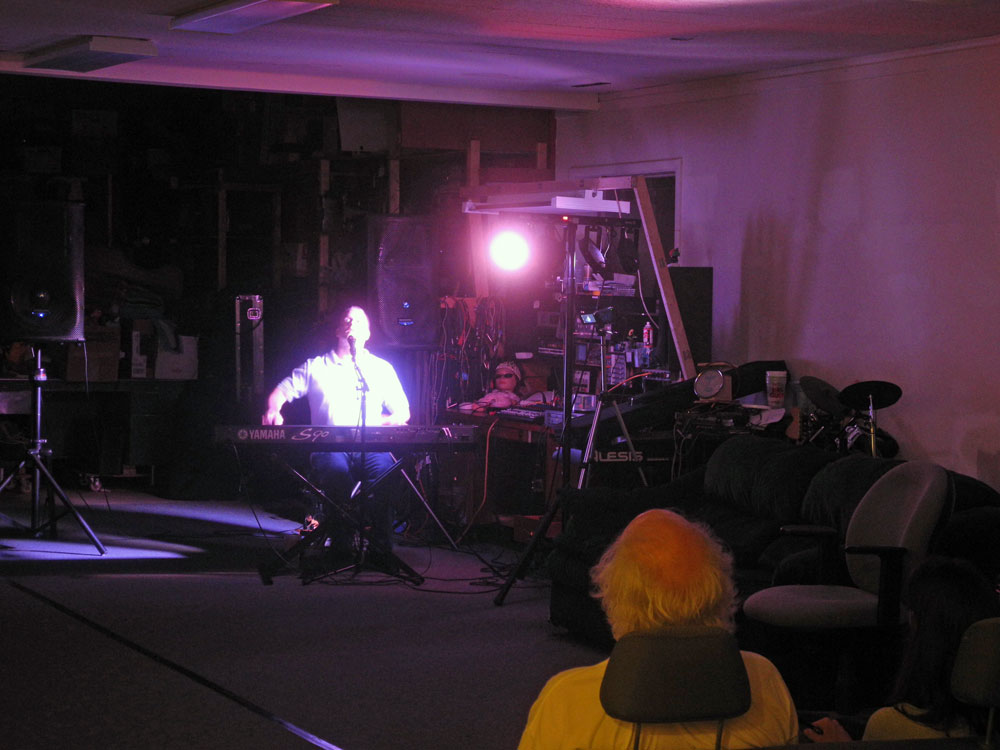 Todd East performing at the Inventors Club in Rochester, New York