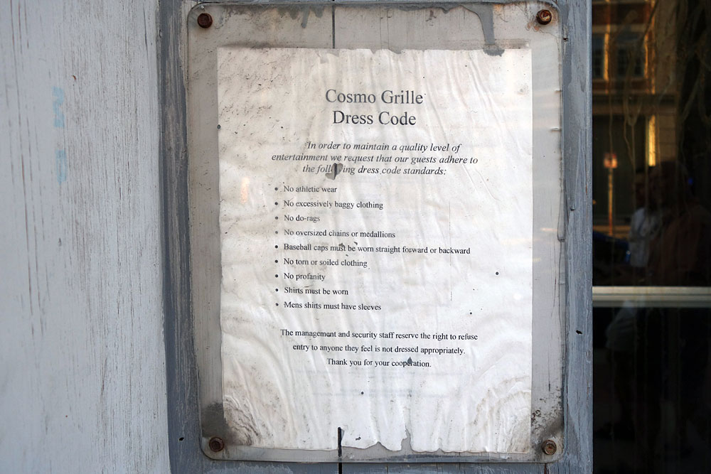 Cosmo Grille Dress Code sign in downtown Rochester, NY