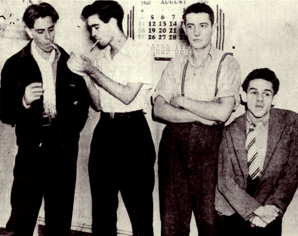Nonchalant after questioning: Robert J. DeMay, Charles F. Guldenshuh, Edward B. Lanagan, Robert G. Meintel Jr., from left, booked in connection with assault on Julius Morrison, who thwarted robbery by wrecking truck against tree.