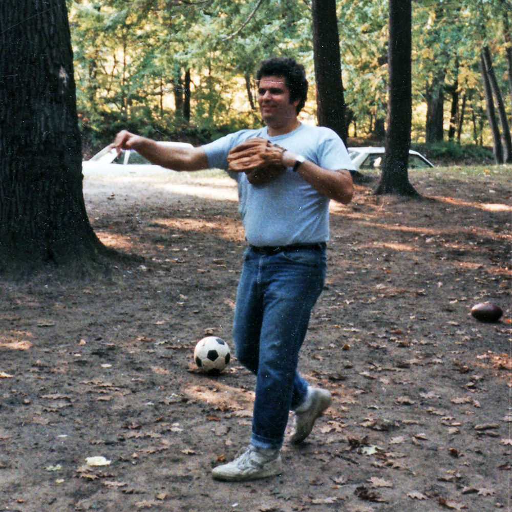 Chuck Cuminale playing catch at Earring Picnic in Durand Eastman Park mid 1980s