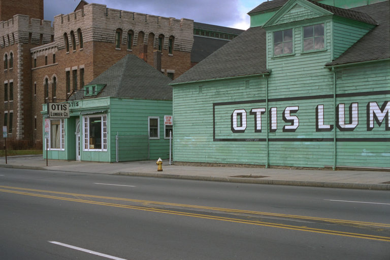 15. Otis Lumber, East Main Street, Rochester. Source photo for Paul Dodd "Passion Play" 1999.