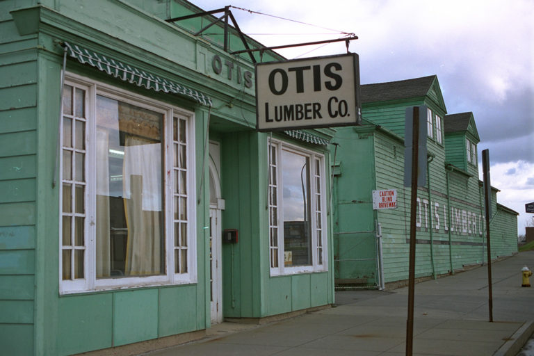 21. Otis Lumber, East Main Street, Rochester. Source photo for Paul Dodd "Passion Play" 1999.
