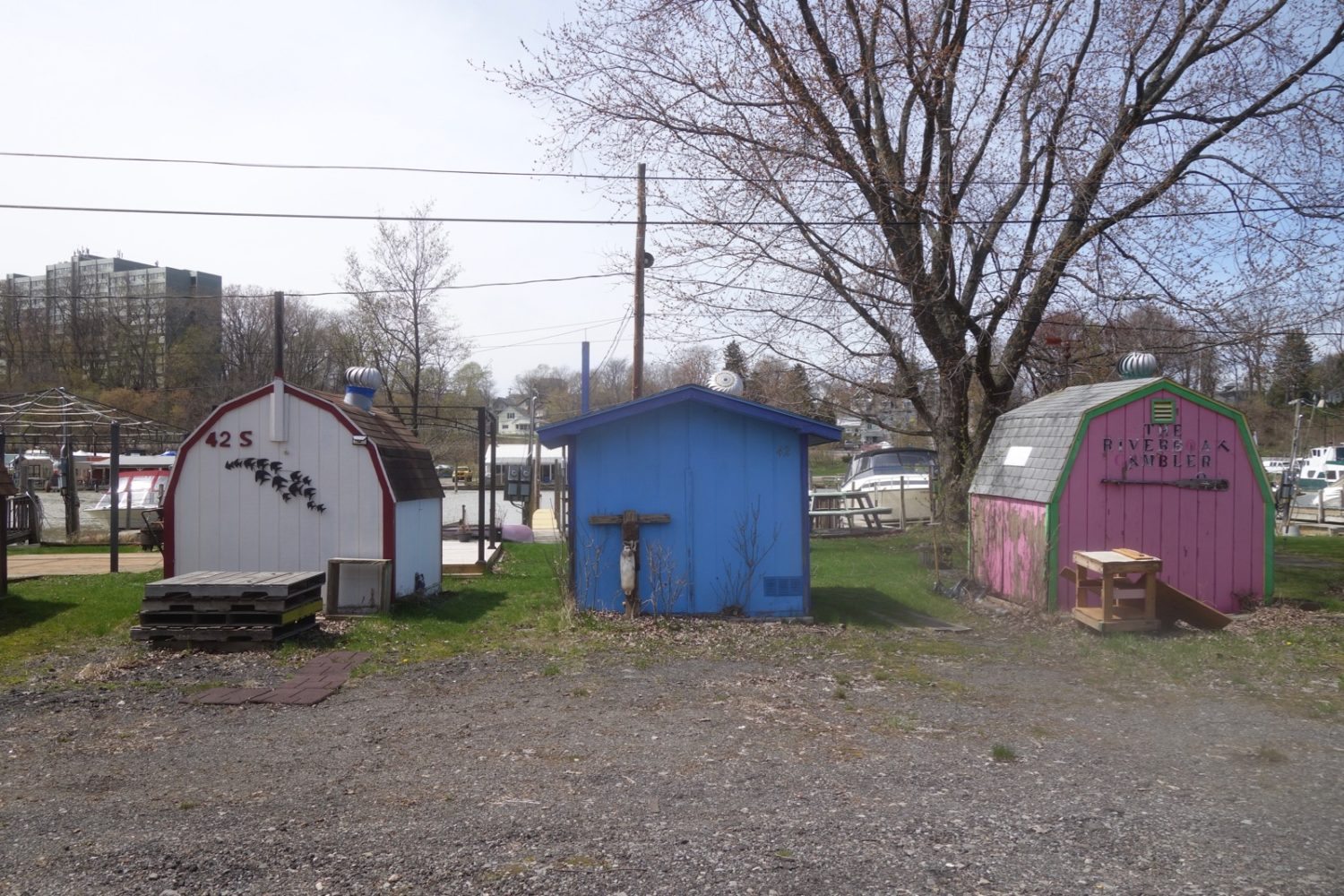 Three small boat houses on Genesee River