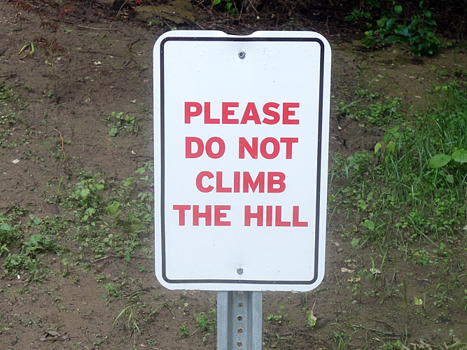 Do Not Climb The Hill sign