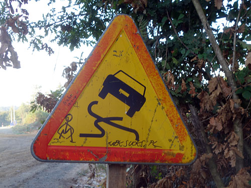 Tire tracks crossing sign