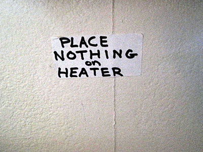 Place Nothing on Heater sign