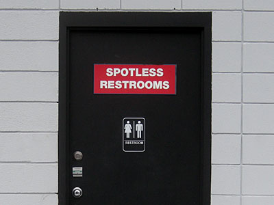 Spotless Restrooms sign