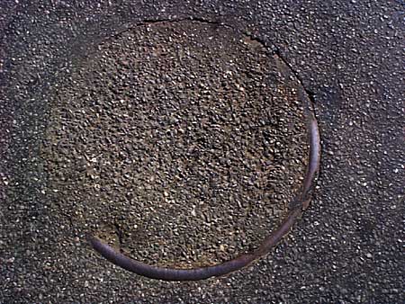 Image from Manhole Mandala slideshow by Paul Dodd 2002