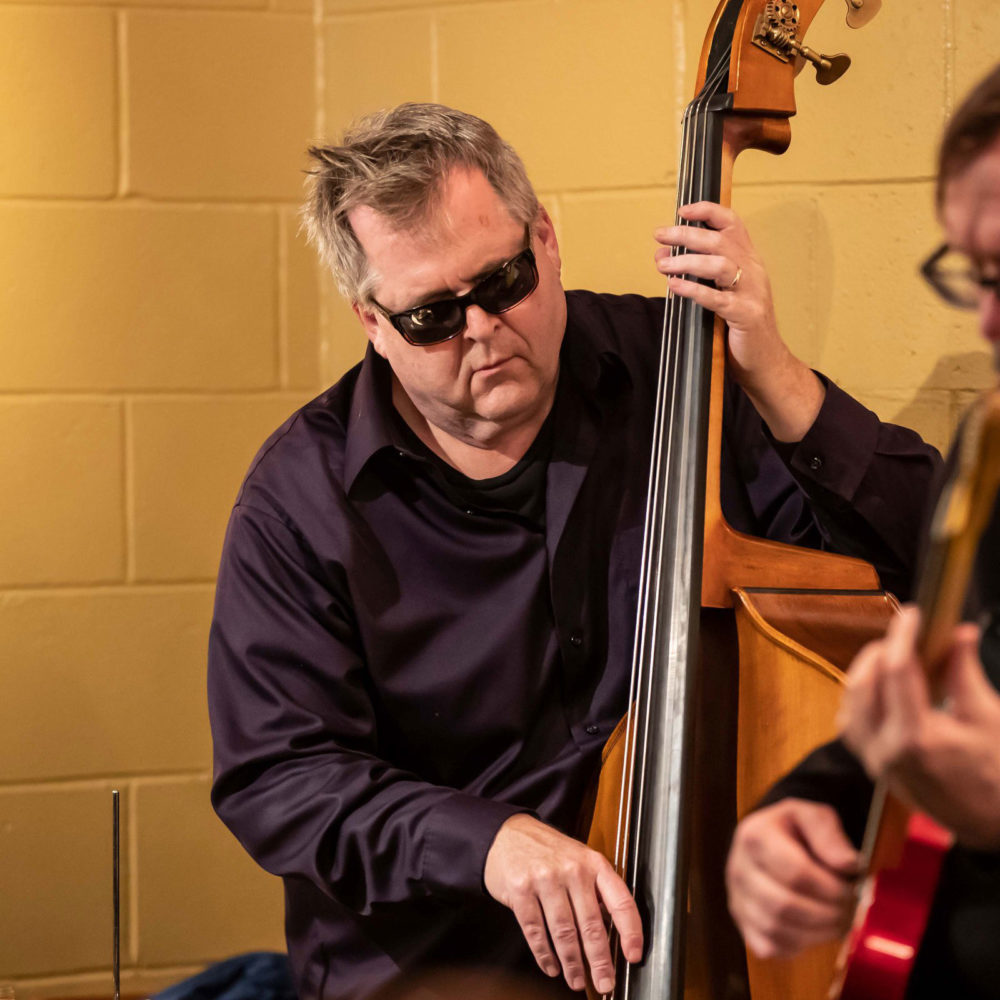 Ken Frank playing bass with Margaret Explosion. Photo by Aaron Winters