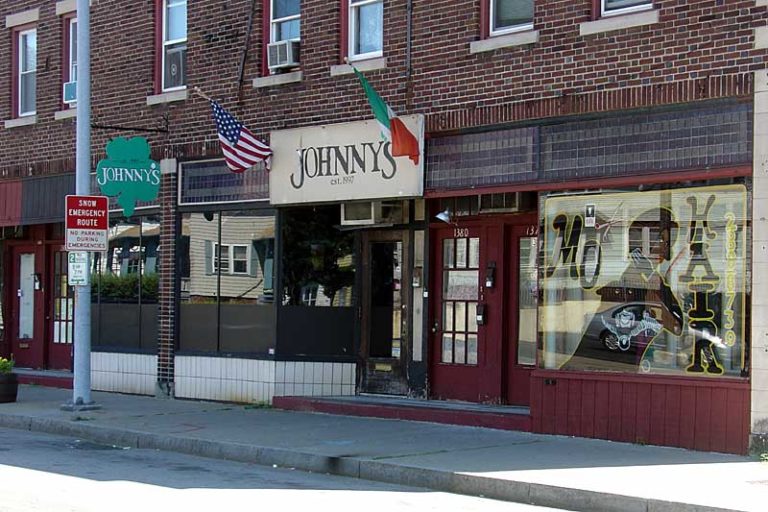 ohnny's made their mark in 1997 by being a "smoke free bar". This sidewalk here is where everyone smoked. Now that all bars are smoke free, they go by "Johnny's Irish Bar". Culver Road in Rochester, New York.