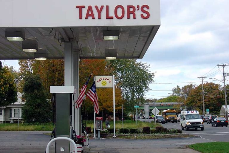 Smiley gas. Taylor's sometimes has the cheapest gas on Culver but Refiners down the street usually takes that prize. Culver Road in Rochester, New York.