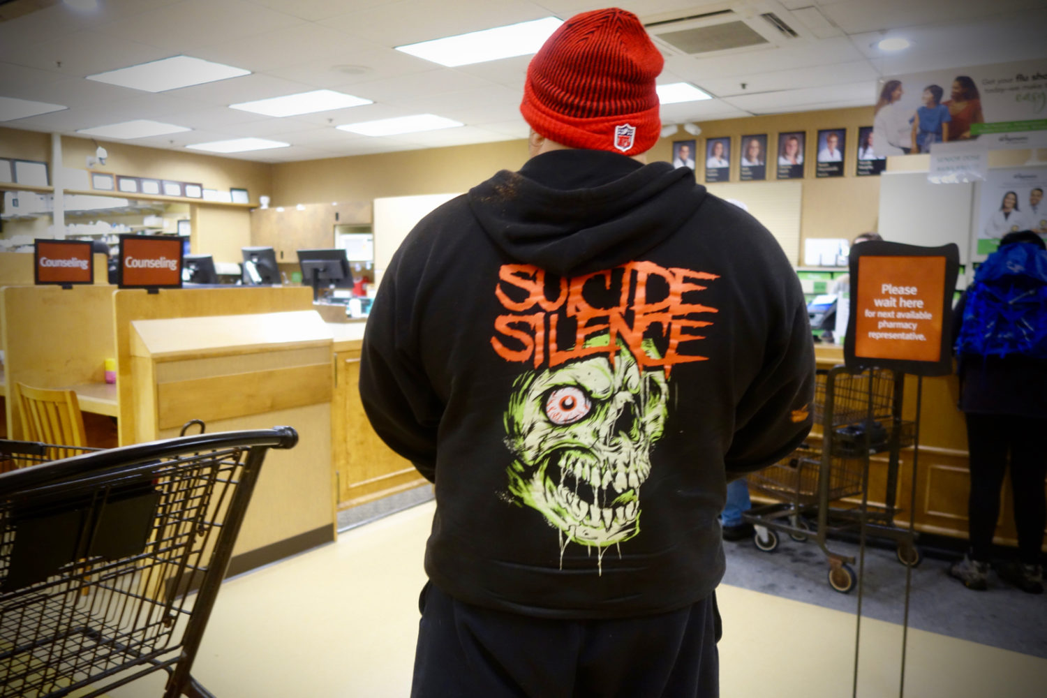 Guy with Suicide Shirt in line at Wegman's Pharmacy