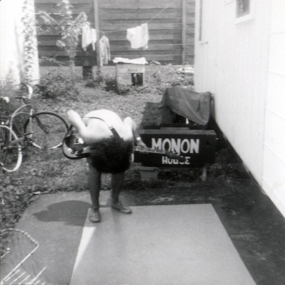 Chinaboise - Jeff with bass guitar outside Monon trailer