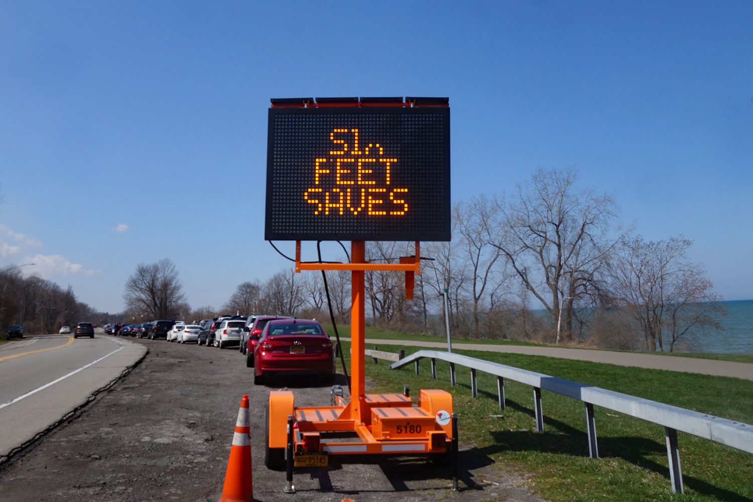 Six Feet Saves Lives sign on Lakeshore Boulevard