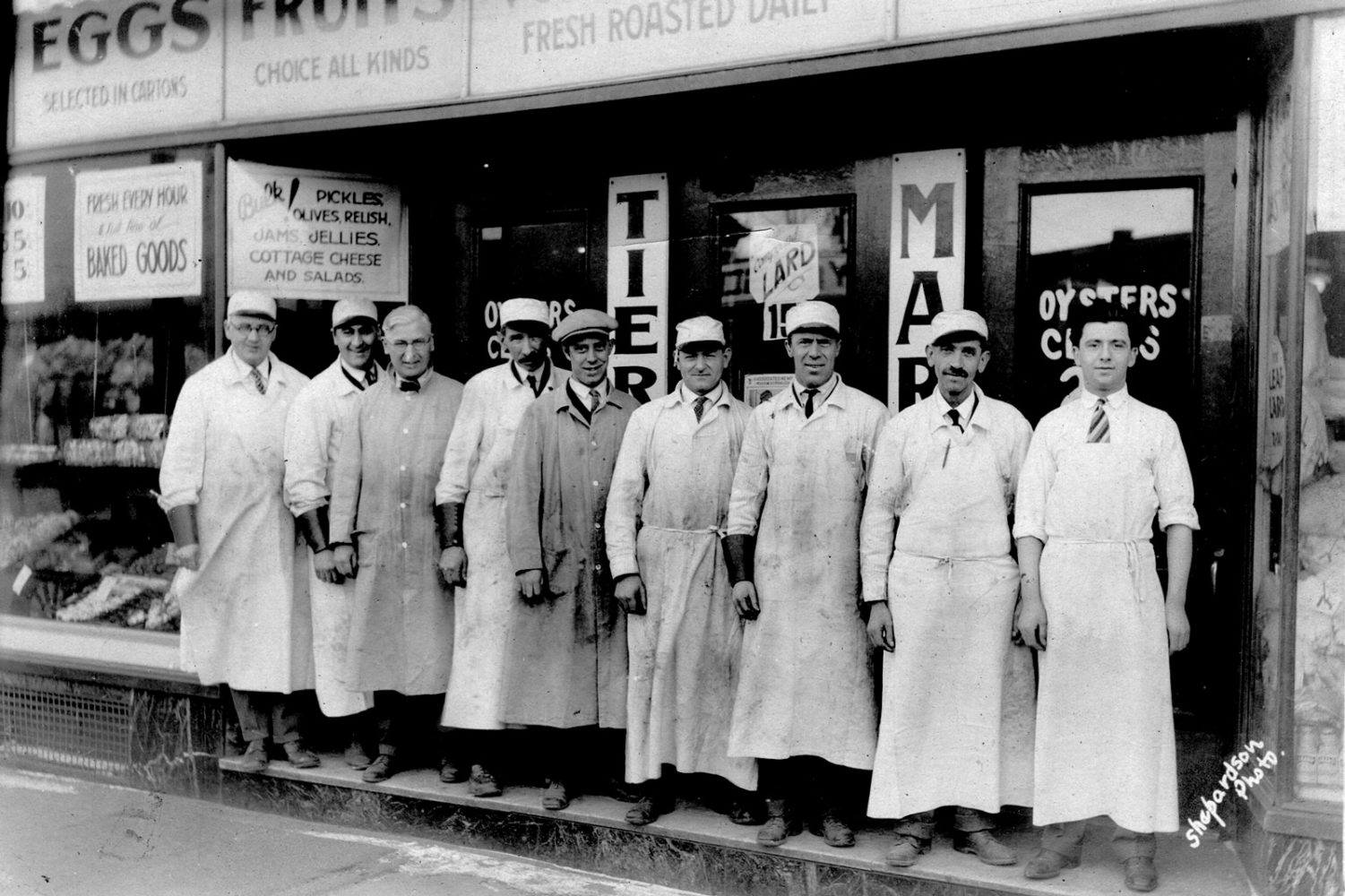 Tierney Market 1930. Owners, Ray Tierney, Art Tierney, Joe Tierney with Joe Switzer, George Fichtner, Hugh Lurtzinger, John Fichtner, Gus Waggenhauser, and "Little Angelo."