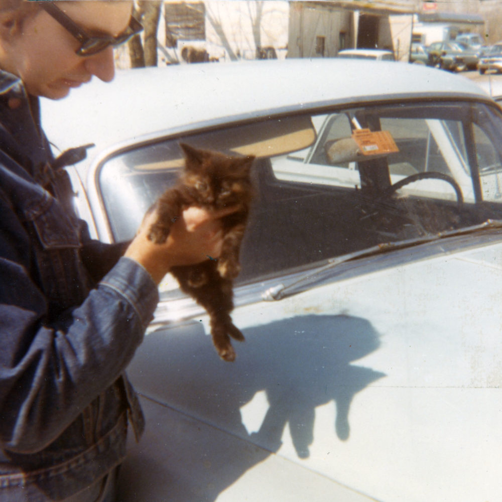 Steve with my cat, Scoop, son of Jennifer, outside the trailer