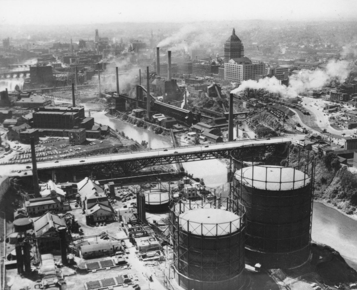 Aerial view of industrial section along Genesee River in Rochester, New York. Kodak Office on Lake Avenue is seen in upper right. - photo from City of Rochester