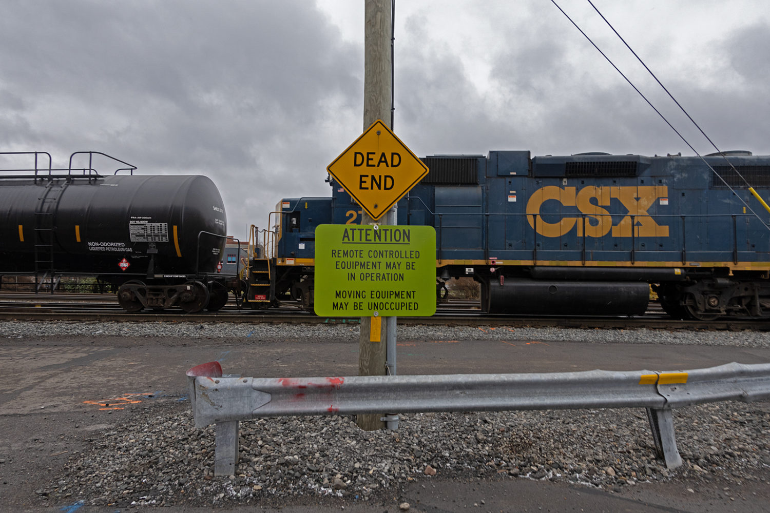 Sign at railroad tracks near Main and Goodman in Rochester, New York
