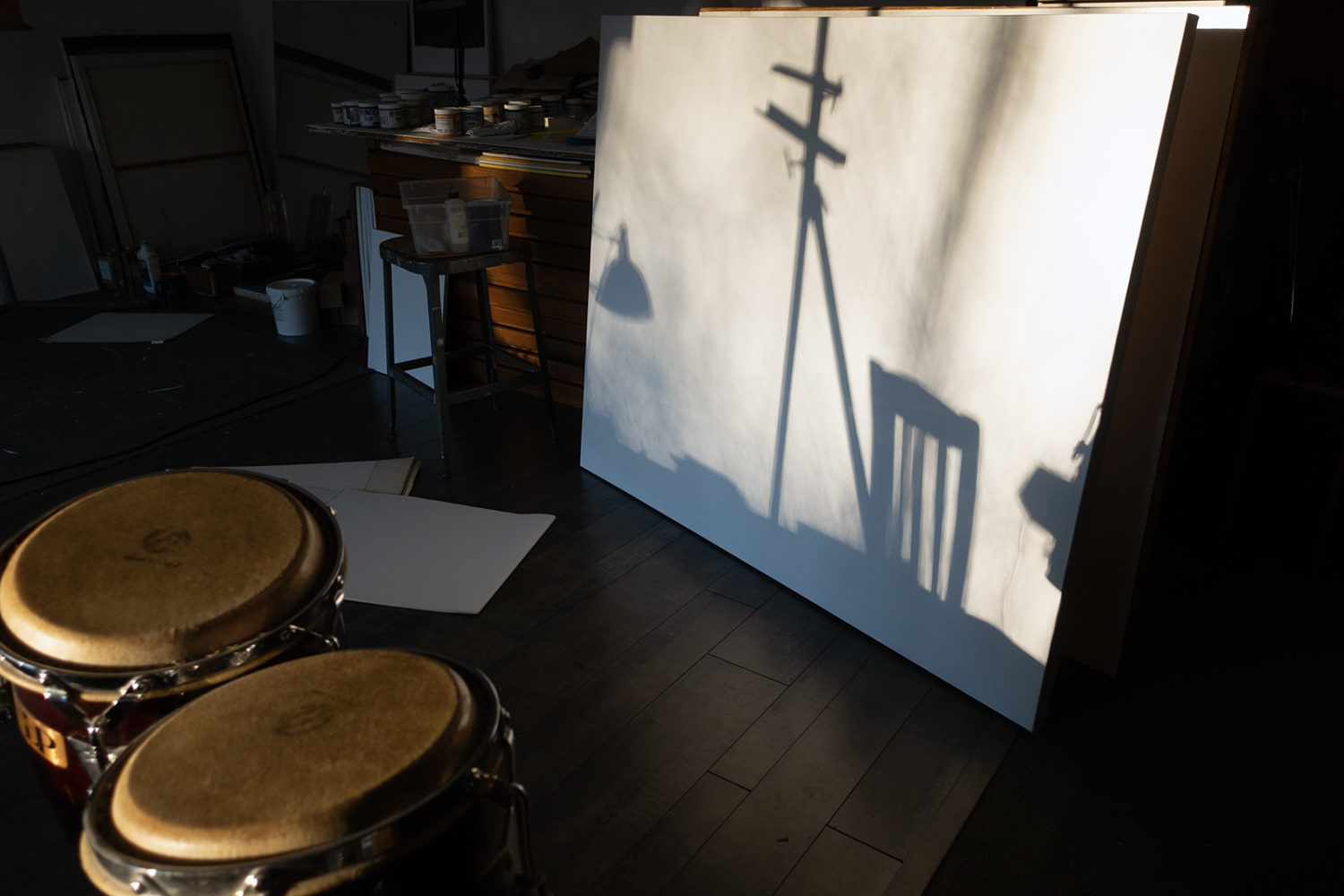 Shadows on primed canvas in studio