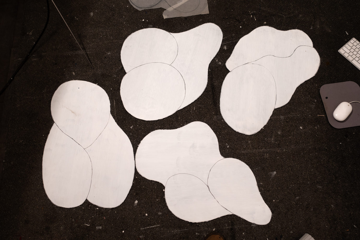 Four forms drawings on cut plastic