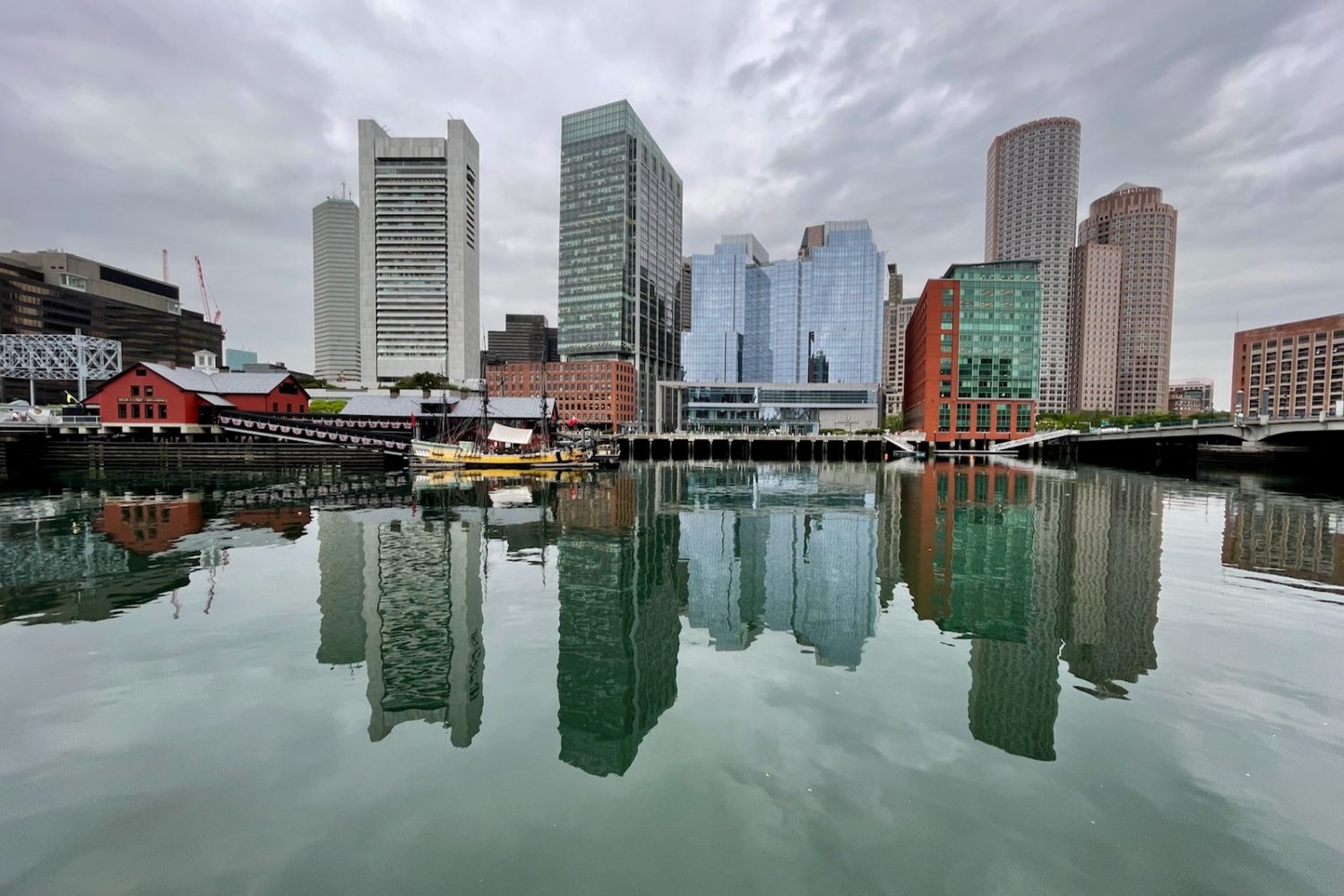 Reflections in Boston Harbor, photo by Peggi Fournier