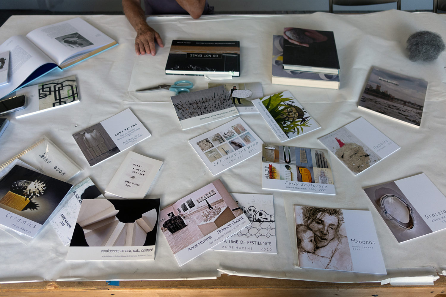 Anne Havens' books on table in Colleen Buzzard's Studio