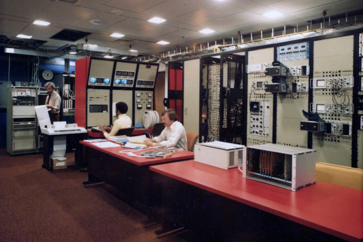 Leo Dodd (far left) at work in UR Laser Lab