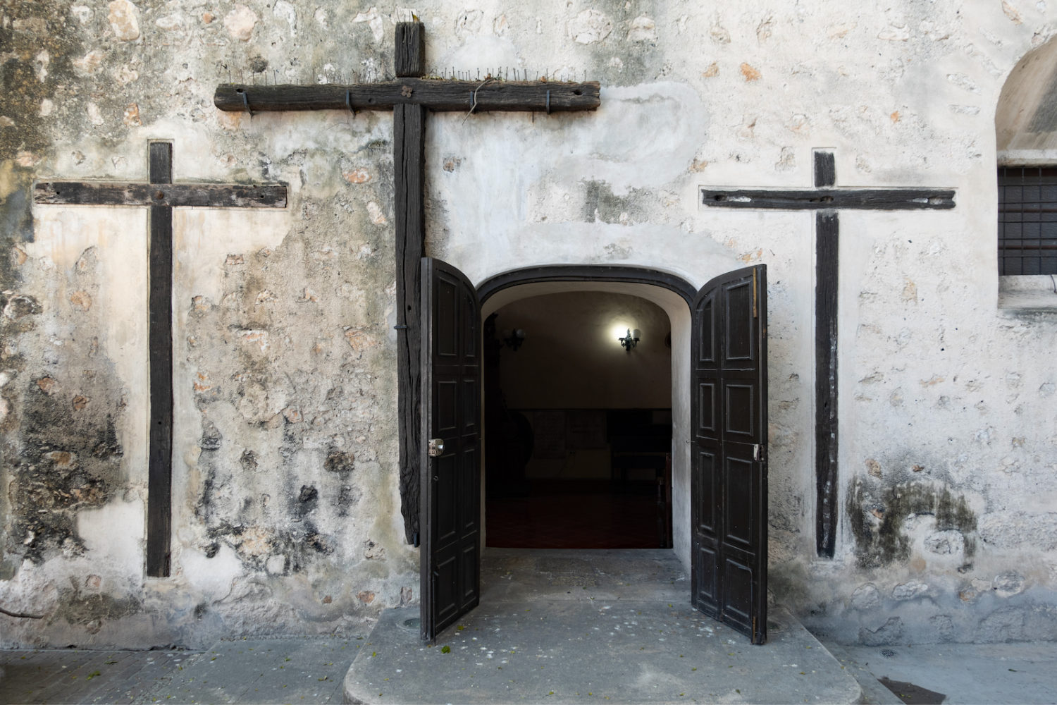 Three crosses near the back door of the Cathedral in Merida