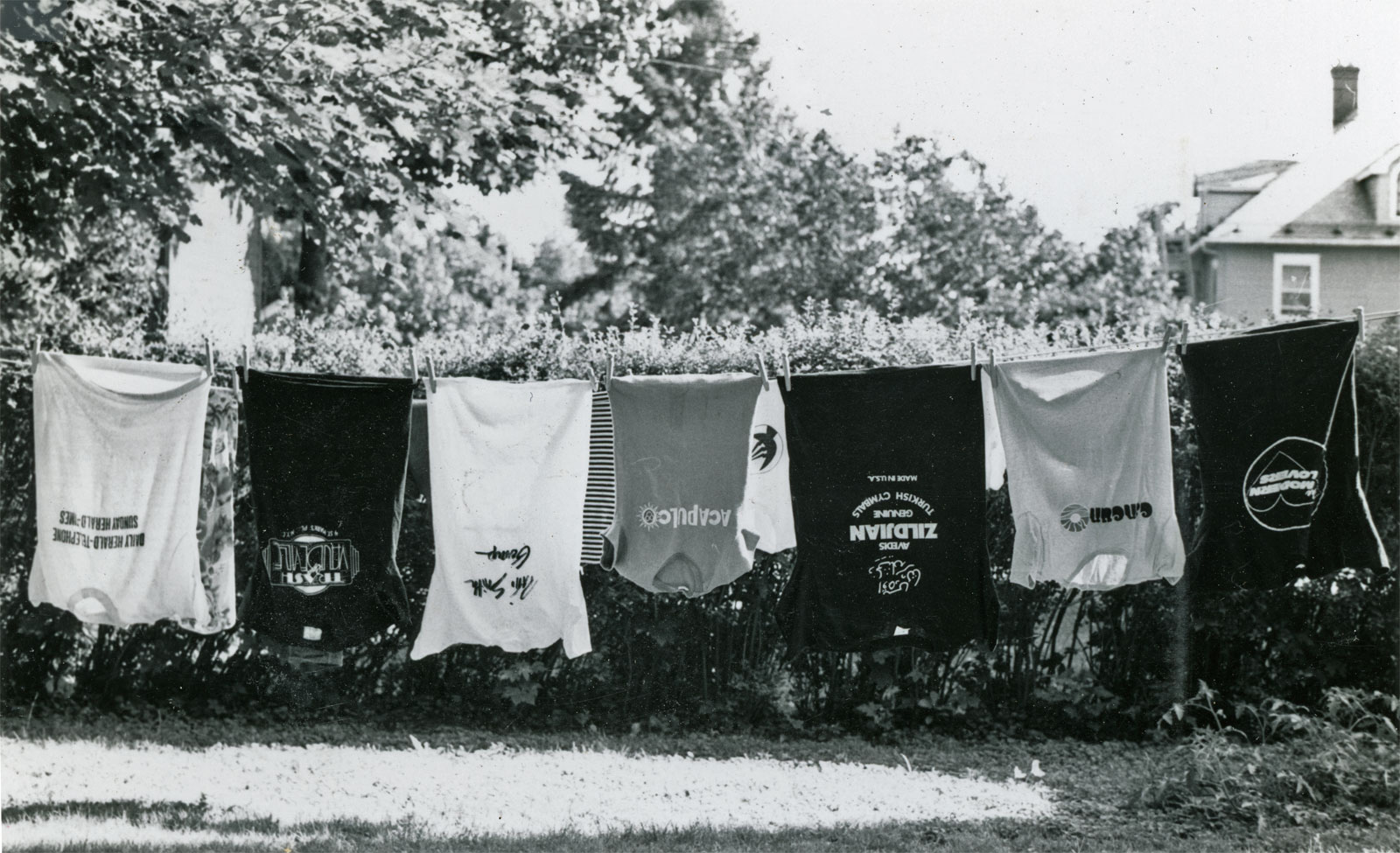 70's t-shirts on clothesline at Dartmouth Street apartment