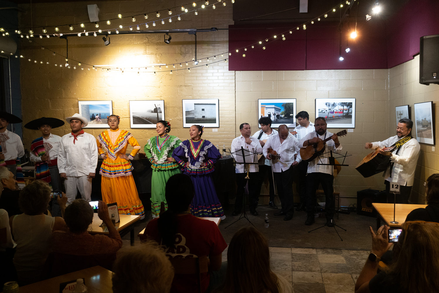 Ensemble Aztlan performing at the Little Theatre Café with Paul Dodd photos on the wall