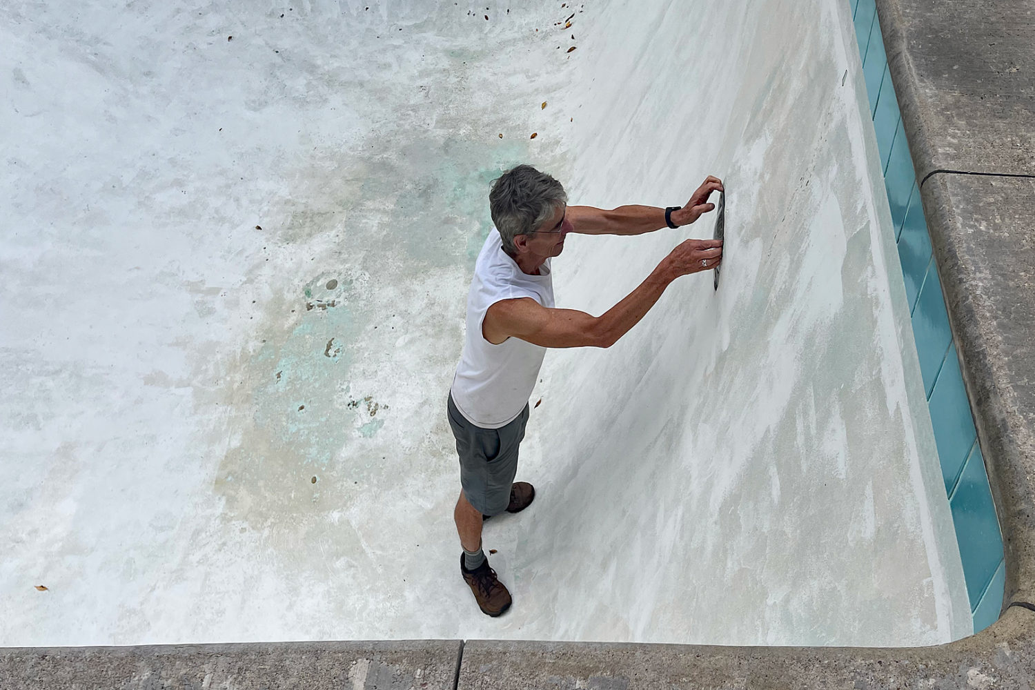 Paul in empty swimming pool. Photo by Peggi Fournier.