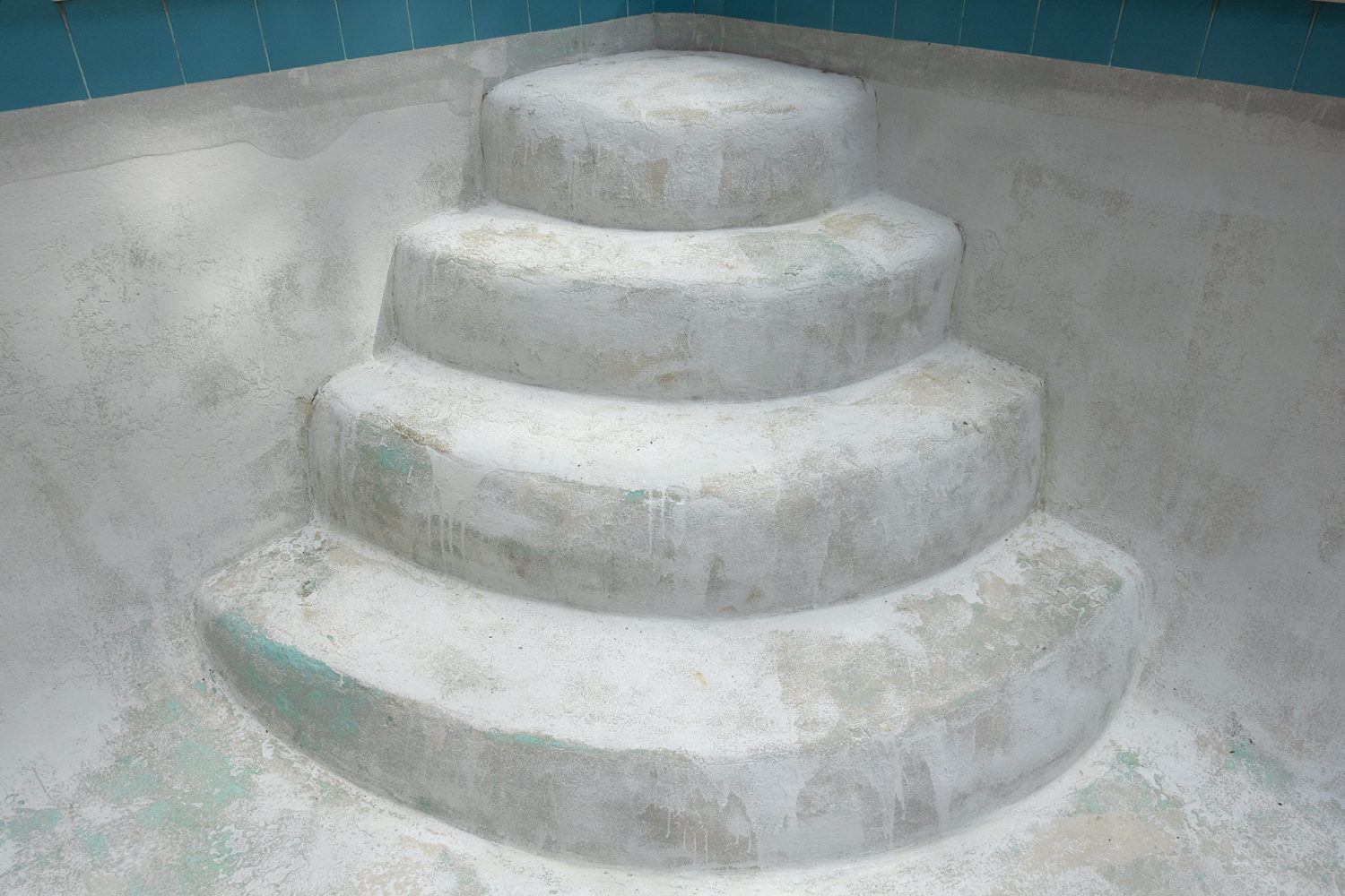 Steps of empty swimming pool