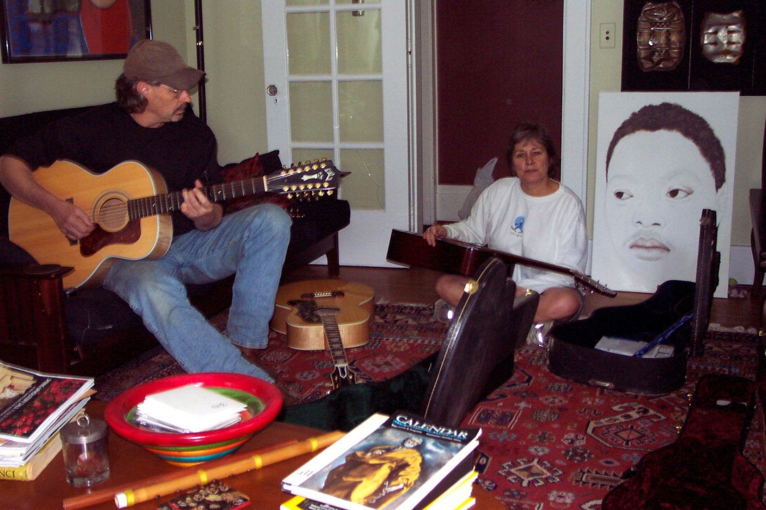 My cousin, Greg, playing guitar with Peggi on Hall Street in Rochester