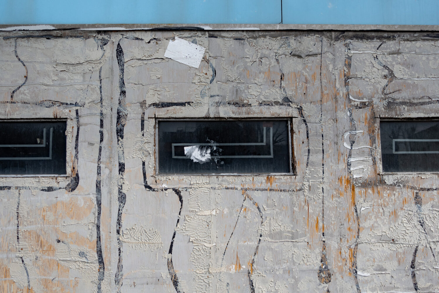 Three windows on South Avenue building