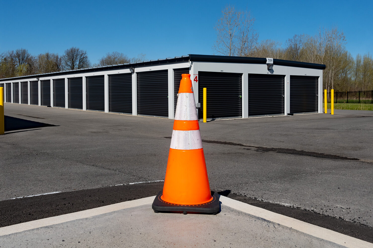 Orange cone at storage lockers Sodus