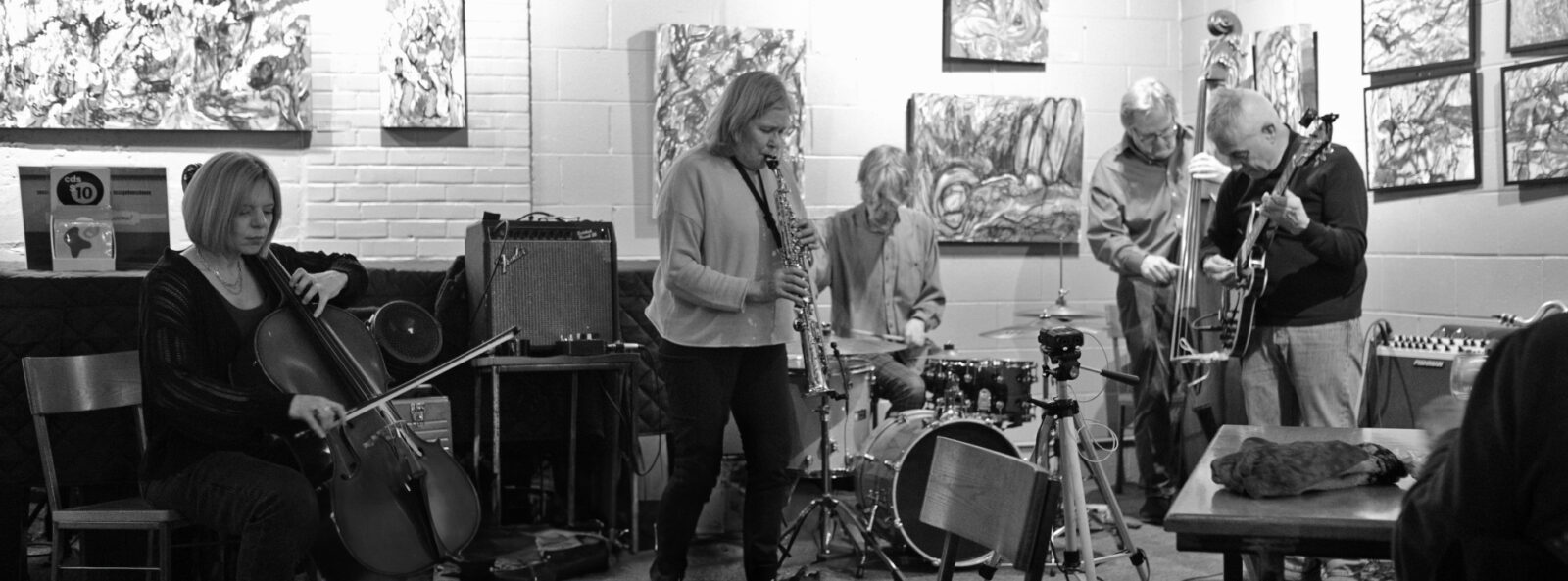Melissa Davies on cello, Peggi Fournier. on saxophone, Paul Dodd on drums, Ken Frank on bass and Jack Schaefer on bass clarinet. Photo by Jason Wilder