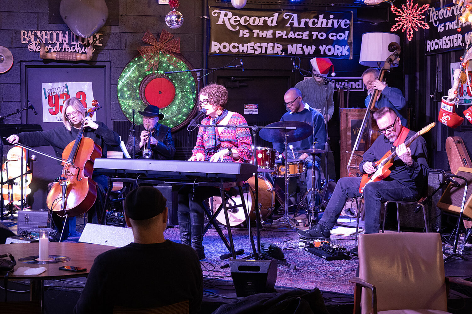Annie Wells and band performing at Record Archive