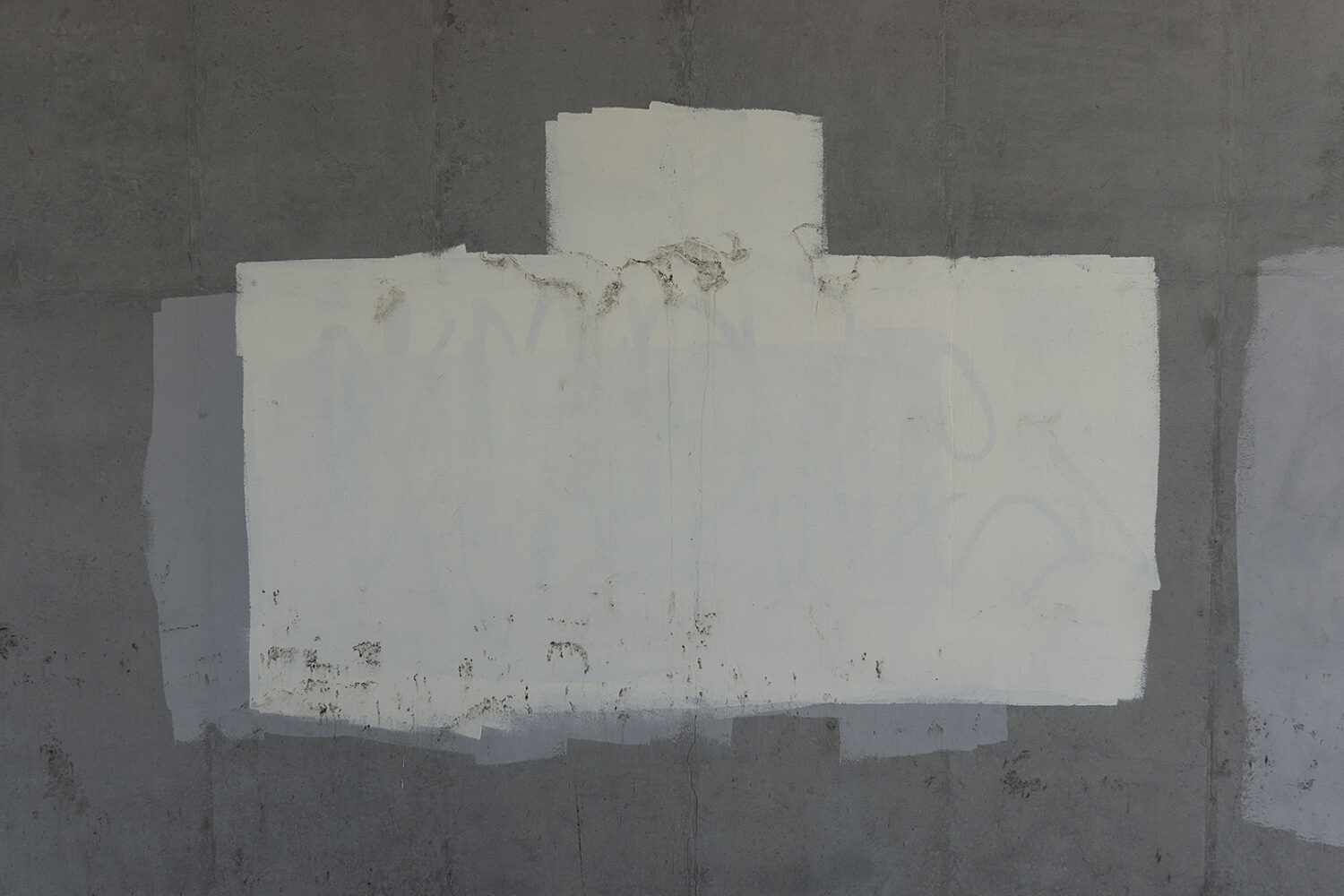 Graffiti cover-up paint on wall under Expressway on East Ridge Road
