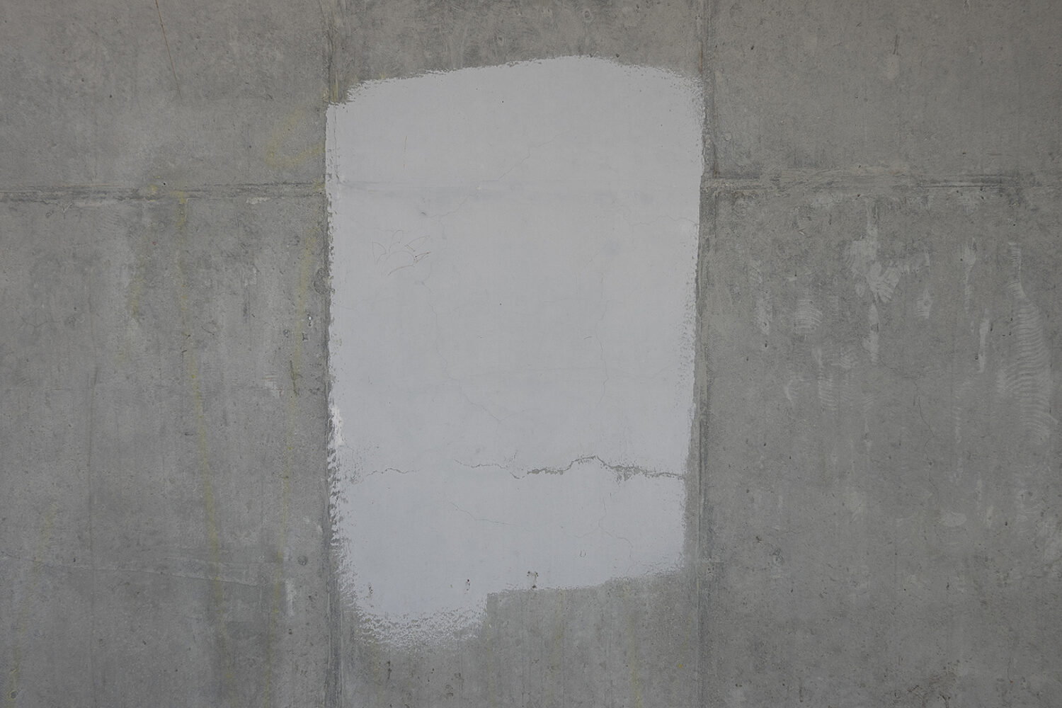 Graffiti cover-up paint on wall under Expressway on East Ridge Road